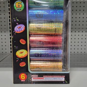 Colorful donut shells on shelf
